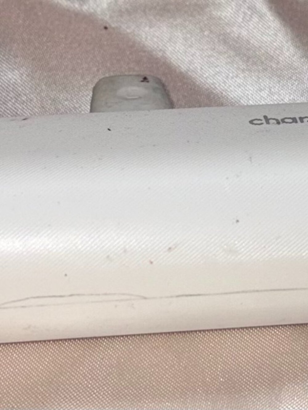 white portable charger